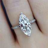 Platinum 4.24 Carat Antique Moval Cut Diamond Engagement Ring