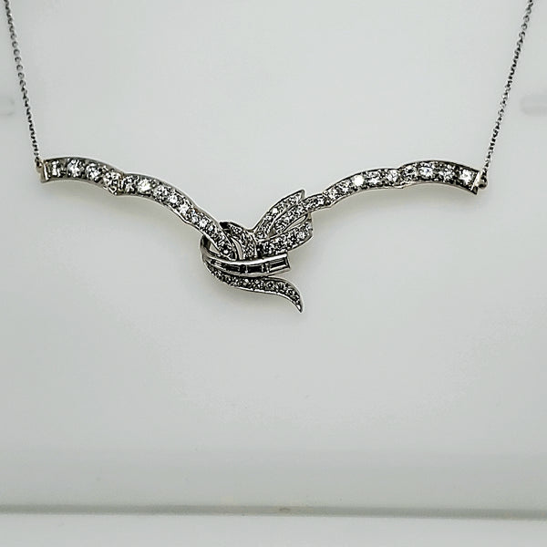 Early Retro period platinum and diamond east/west necklace