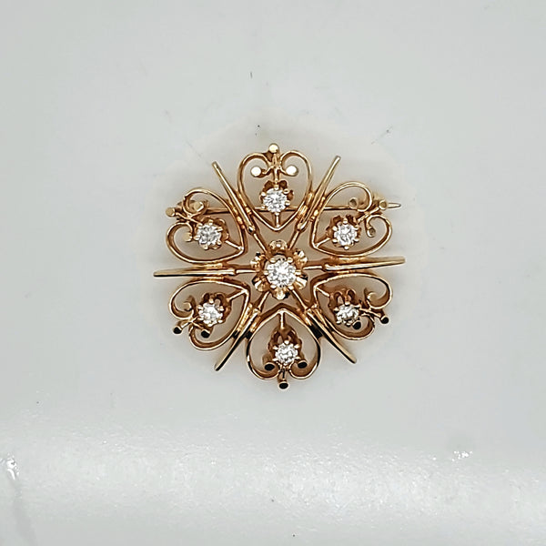 Vintage 14kt gold and diamond starburst brooch/pendant