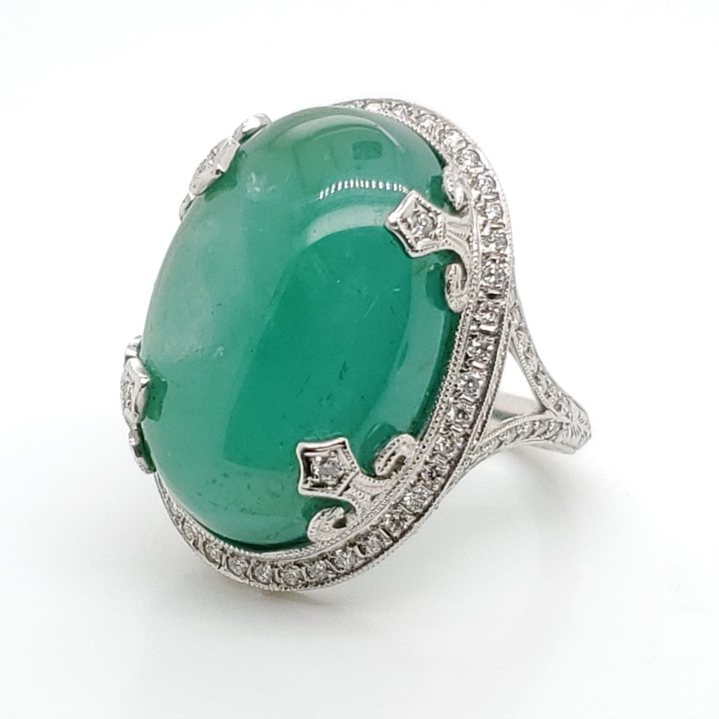 Cabochon Cut 27.60 Carat Emerald In Custom Platinum And Diamond Mounting