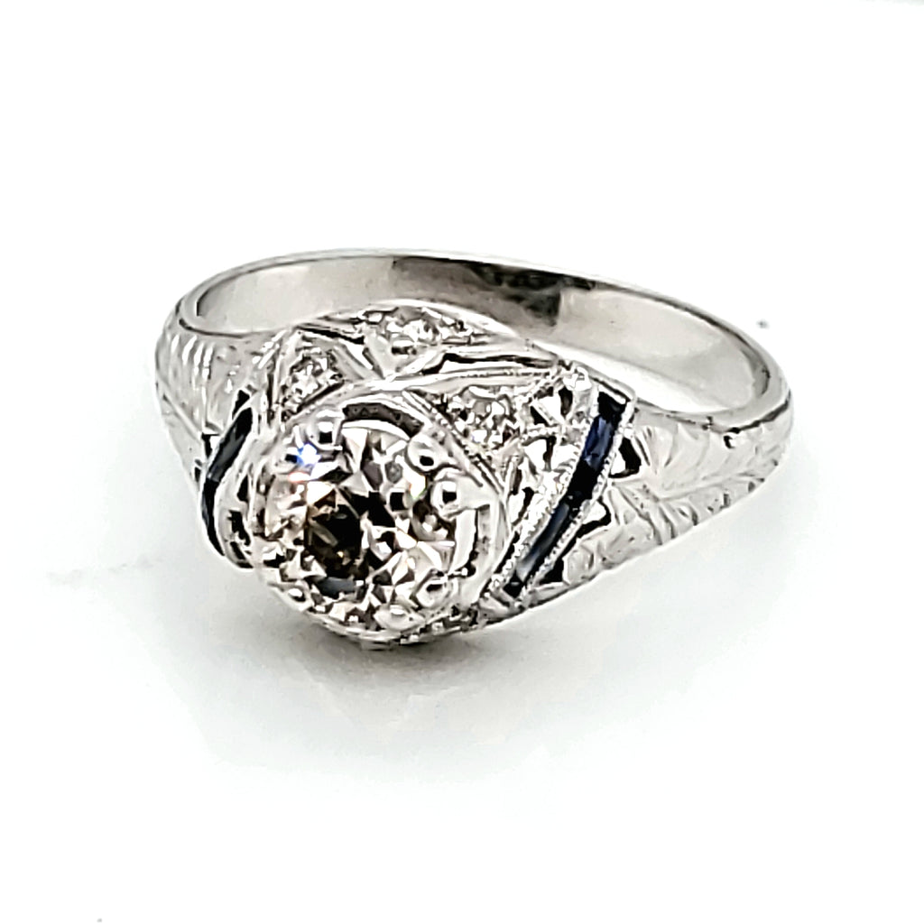 Art Deco platinum and sapphire .70 carat round, european cut diamond filigree ring