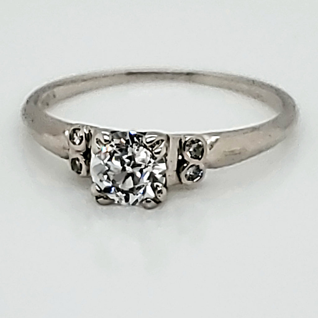 Art Deco 18kt gold and .47 carat round, european cut diamond engagement ring