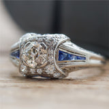 Art Deco Platinum .60 Carat European Cut Diamond and Sapphire Engagement Ring