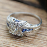 Art Deco Platinum .60 Carat European Cut Diamond and Sapphire Engagement Ring