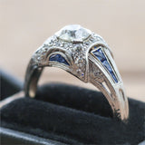 Art Deco Platinum .60 Carat European Cut Diamond and Sapphire Engagement Ring