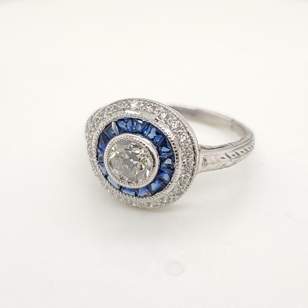 Platinum .67 Carat European Cut Diamond and Sapphire Engagement Ring