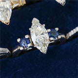 14kt White Gold 1.85 Carat Marquise Shaped Diamond Engagement Ring with Sapphire Accents