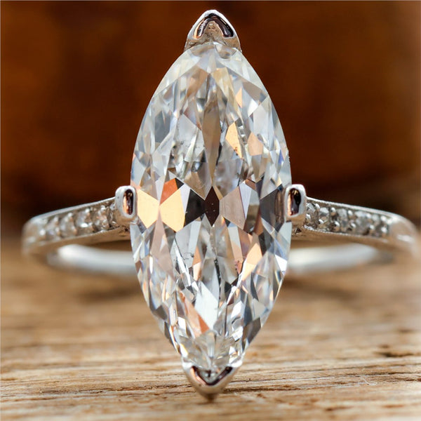 Platinum 4.24 Carat Antique Moval Cut Diamond Engagement Ring