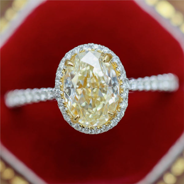 1.80ct Oval Cut Fancy Yellow Diamond 18kt White And Yellow Gold Halo Ring