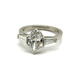 1.91Ctw Platinum Three Stone Oval Diamond And Baguette Engagement Ring