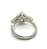 1.91Ctw Platinum Three Stone Oval Diamond And Baguette Engagement Ring