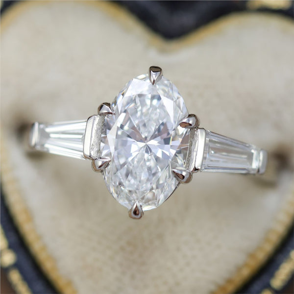 1.91Ctw Platinum Three Stone Oval Diamond And Baguette Engagement Ring