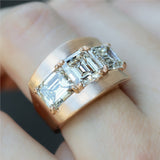 18kt Rose Gold Three Emerald Cut Diamond Ring