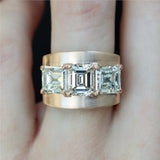 18kt Rose Gold Three Emerald Cut Diamond Ring