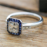 Platinum 1.05 Carat Asscher Cut Diamond And Sapphire Engagement Ring