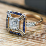 18kt Yellow Gold 1.75 Carat Asscher Cut Diamond and Sapphire Ring