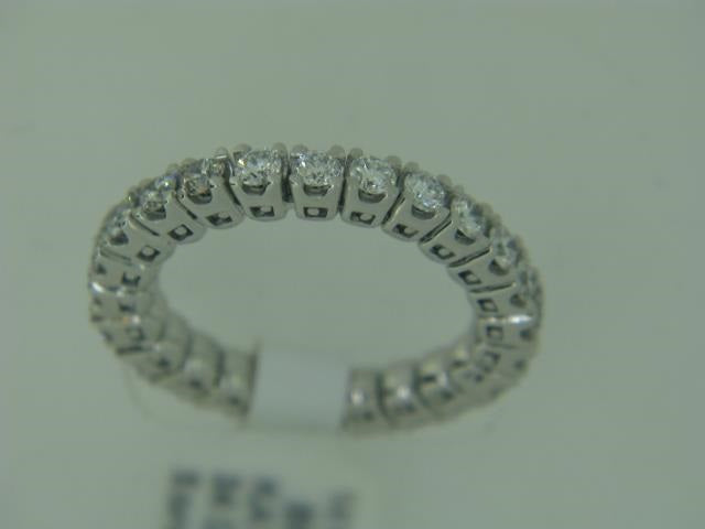 14kt white gold Eternity Spryng Band.