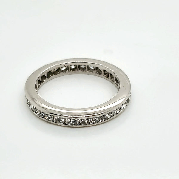 Platinum and diamond eternity wedding band