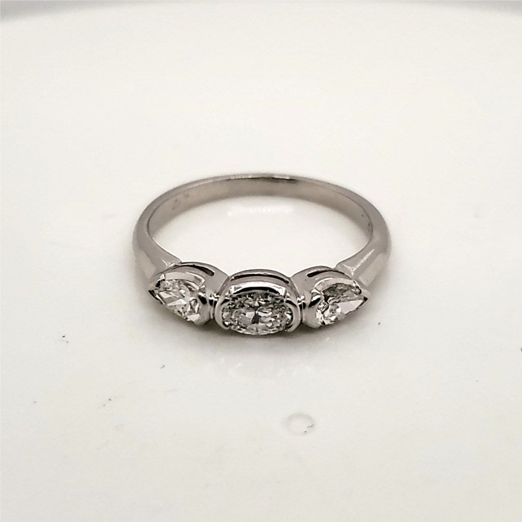 Platinum Oval and Pear Shaped Diamond Band