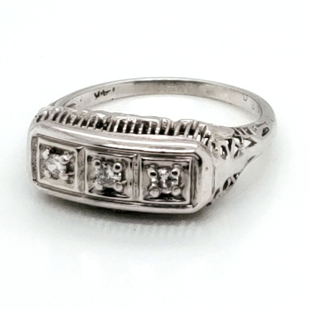 14kt white gold Art Deco three round diamond filigree ring