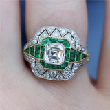 Art Deco Inspired Platinum Asscher Cut Diamond and Emerald Ring