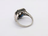Platinum and Diamond Ring with Blue Sapphire Halo