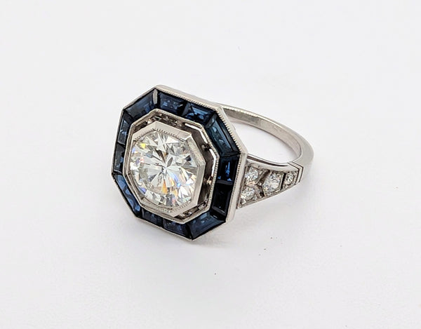 Platinum and Diamond Ring with Blue Sapphire Halo