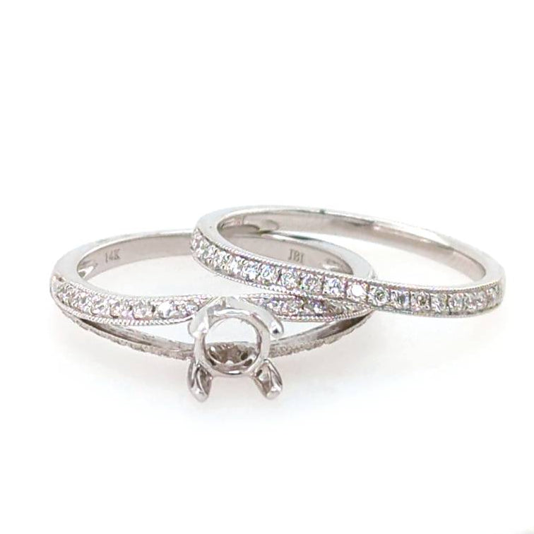 14kt white gold diamond wedding set.