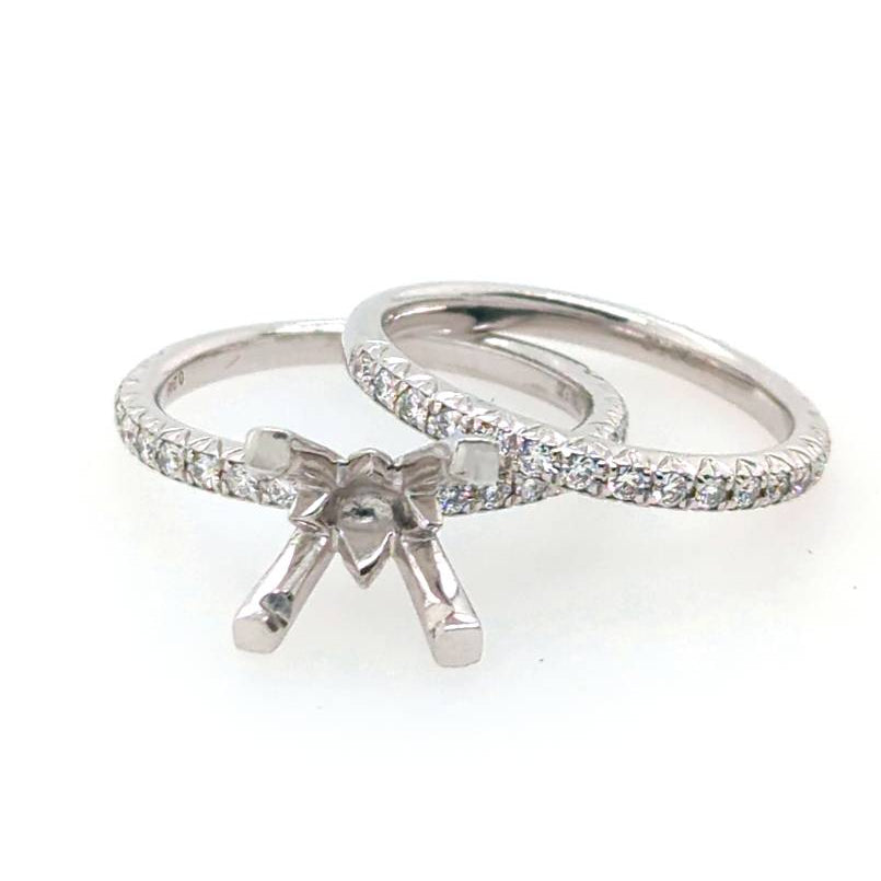 Platinum diamond wedding set with matching band.