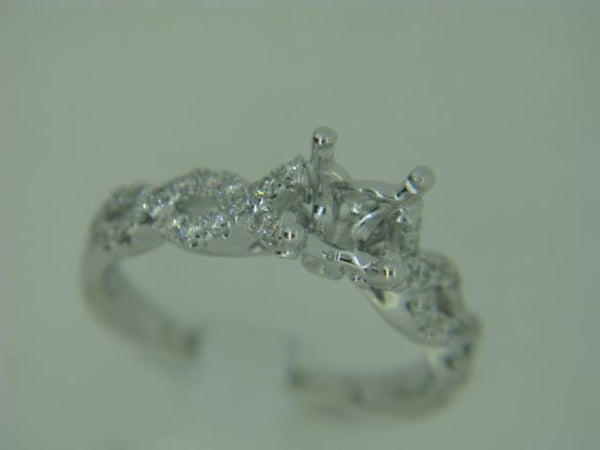 14kt white gold diamond semi-mount.