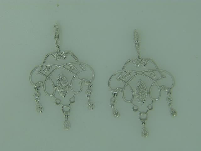 14kt white gold diamond earrings.