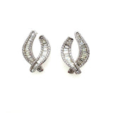 14kt White Gold Baguette And Brilliant Round Cut Diamond Wave Earrings