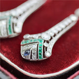 Modern Art Deco Style Platinum Diamond Emerald and sapphire Dangle Earrings