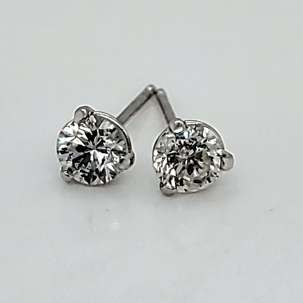 .69 Carat Total Weight Round Diamond Stud Earrings