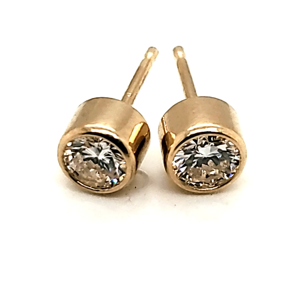 .60 Carat Total Weight Bezel Set Round Diamond Stud Earrings