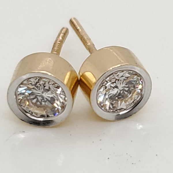 .60 Carat Total Weight Round Diamond Stud Earrings