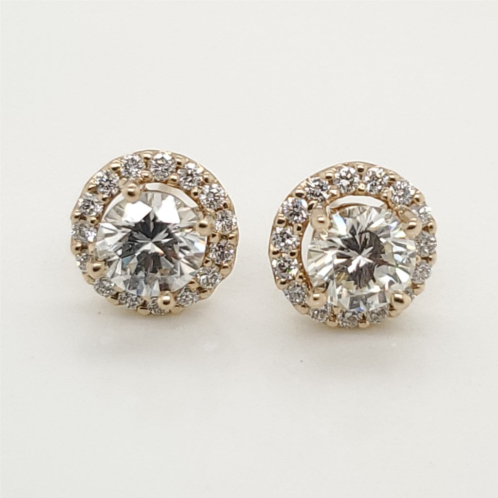 1.07 Carat Total Weight Round Diamond Stud Earrings