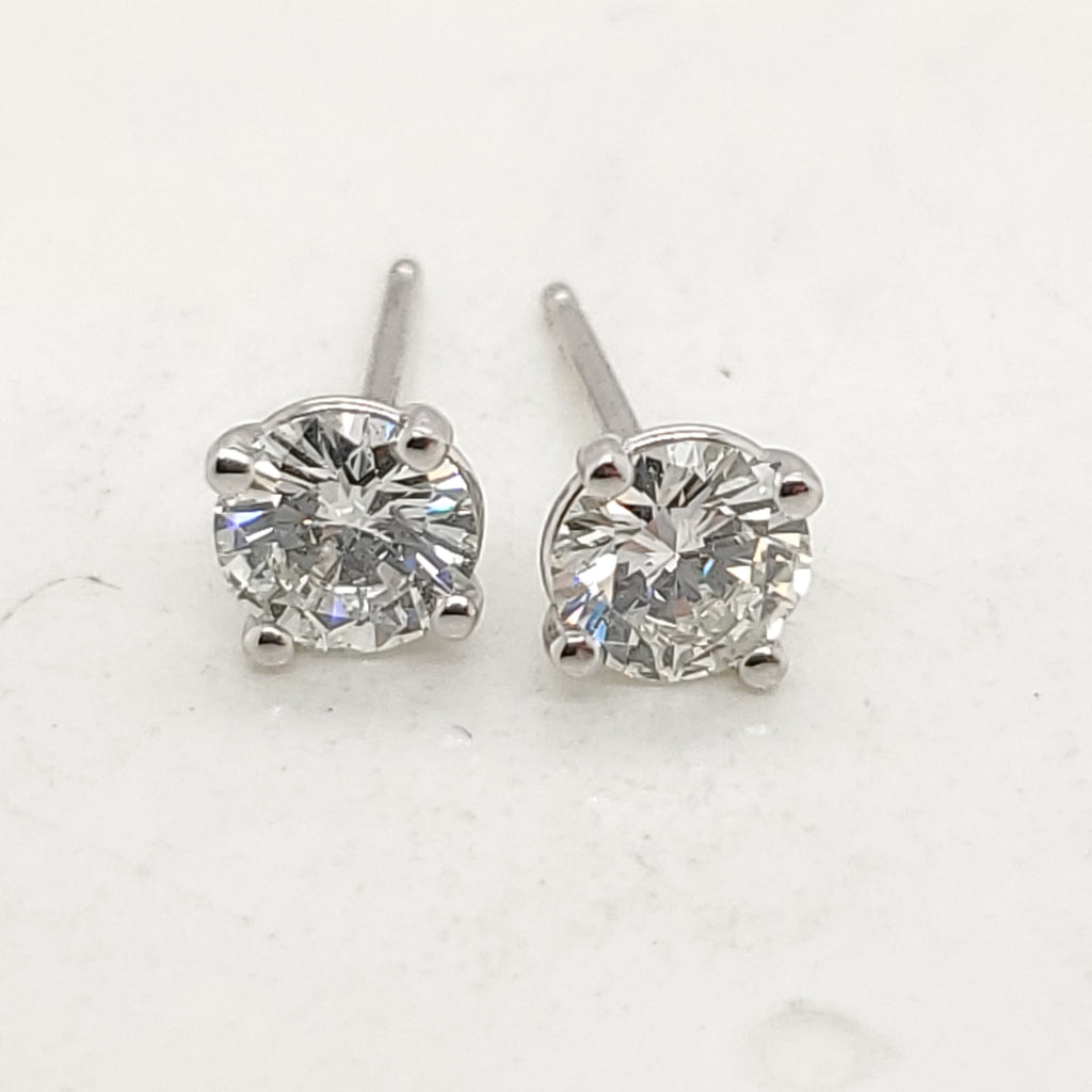 .71 Carat Total Weight Round Diamond Stud Earrings