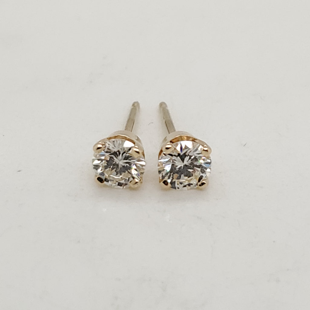 .50 Carat Total Weight Diamond Stud Earrings