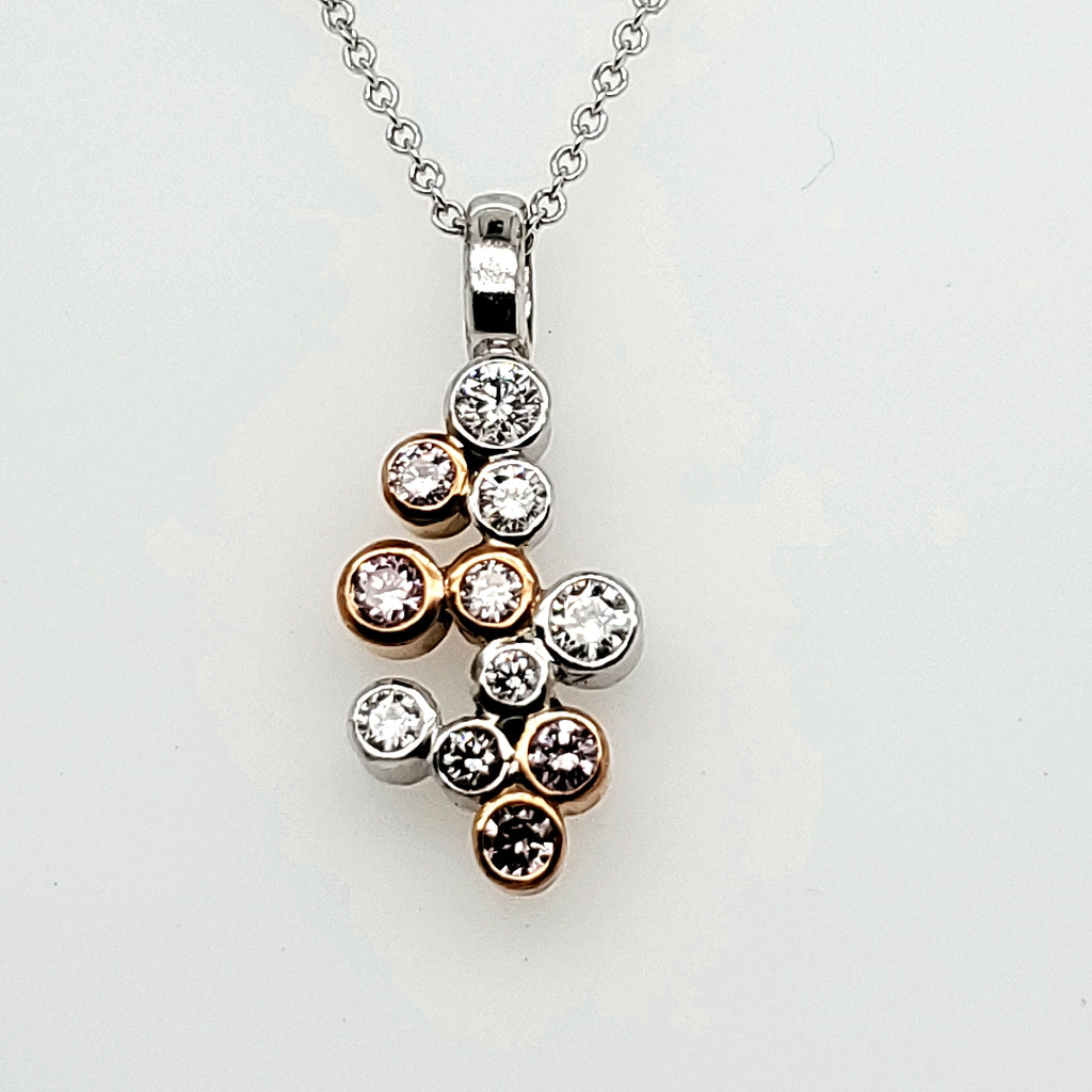 18kt white and natural pink diamond pendant