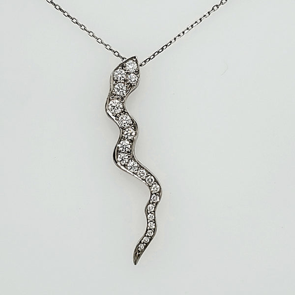 Platinum snake pendant with an estimated one carat of diamonds