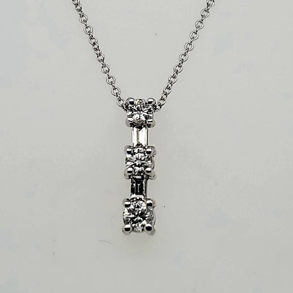 14kt White Gold Three Round and Two Baguette Cut Diamond Journey Pendant