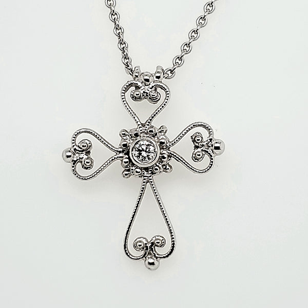 18kt white gold and diamond cross pendant