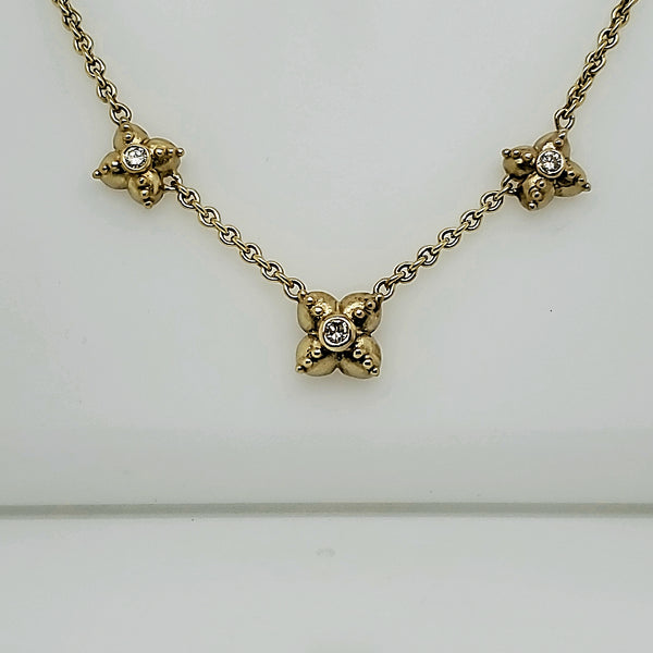 14kt yellow gold three diamond station necklace