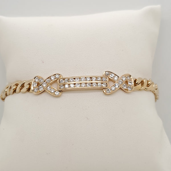 14kt Yellow Gold and Diamond Bypass Design Bracelet