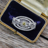 Art Deco Platinum Numbered Round and Baguette Cut Diamond Brooch