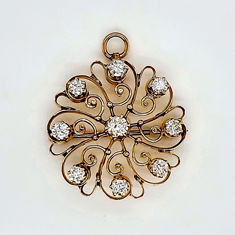Vintage 14kt gold and diamond starburst brooch/pendant