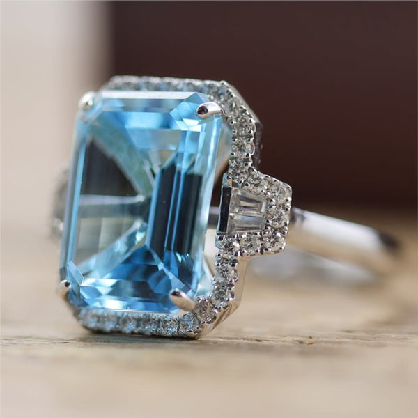 14kt White Gold Blue Topaz And Diamond Ring