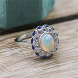 18kt White Gold Opal, Diamond, And Sapphire Ring