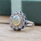 18kt White Gold Opal, Diamond, And Sapphire Ring